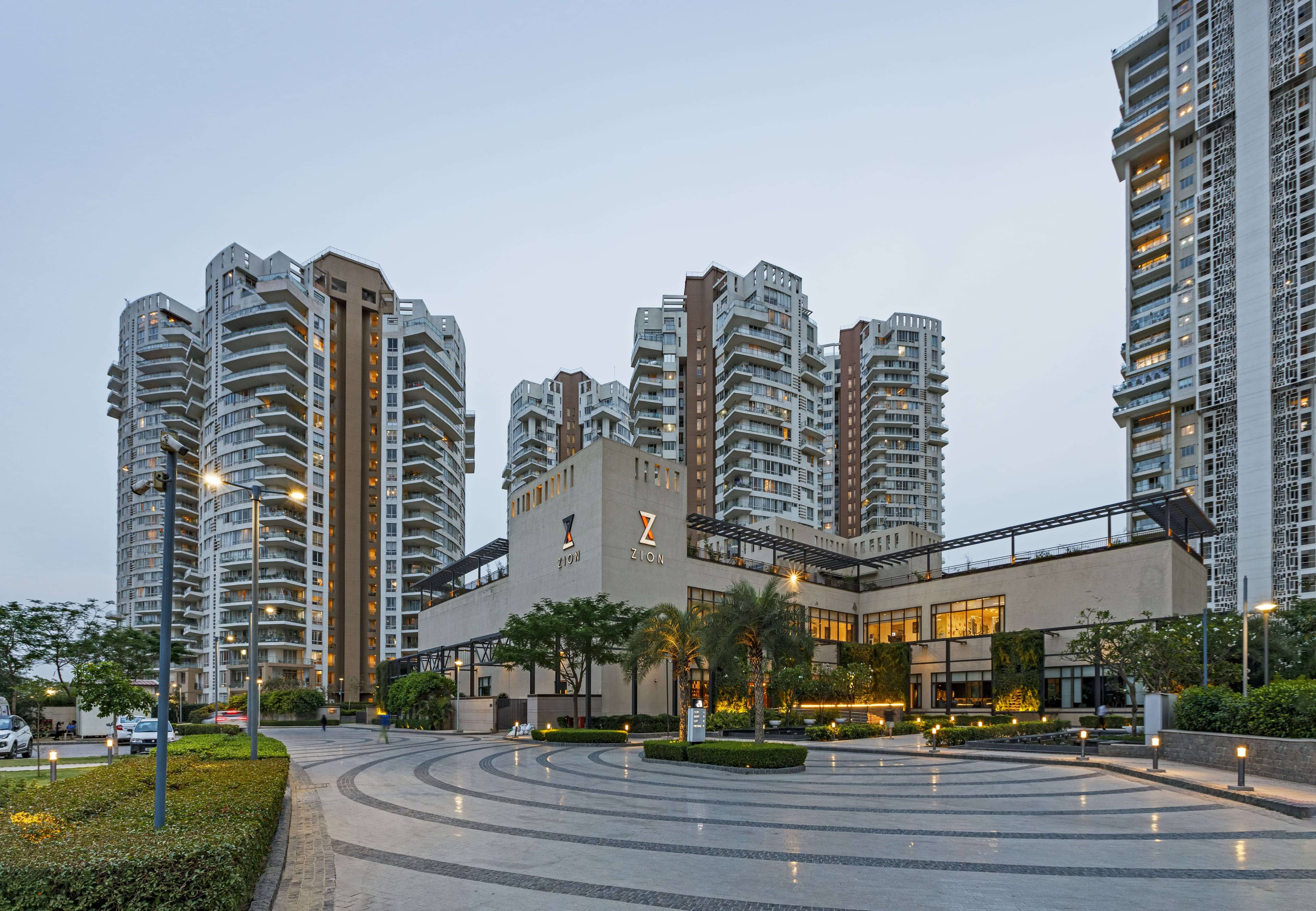 Pioneer Urban Presidia Sector 62, Gurgaon Presidia - Clubhouse at Dusk